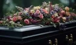 coffin with flowers at a funeral ceremony