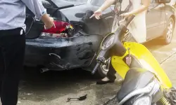 motorcycle accident with car on the street